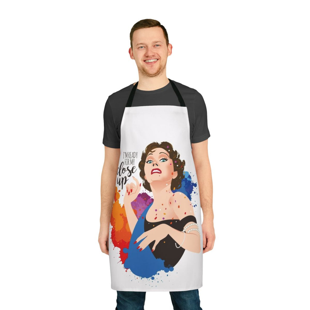 Close-up view of a high-quality apron featuring a classic Hollywood cinema design