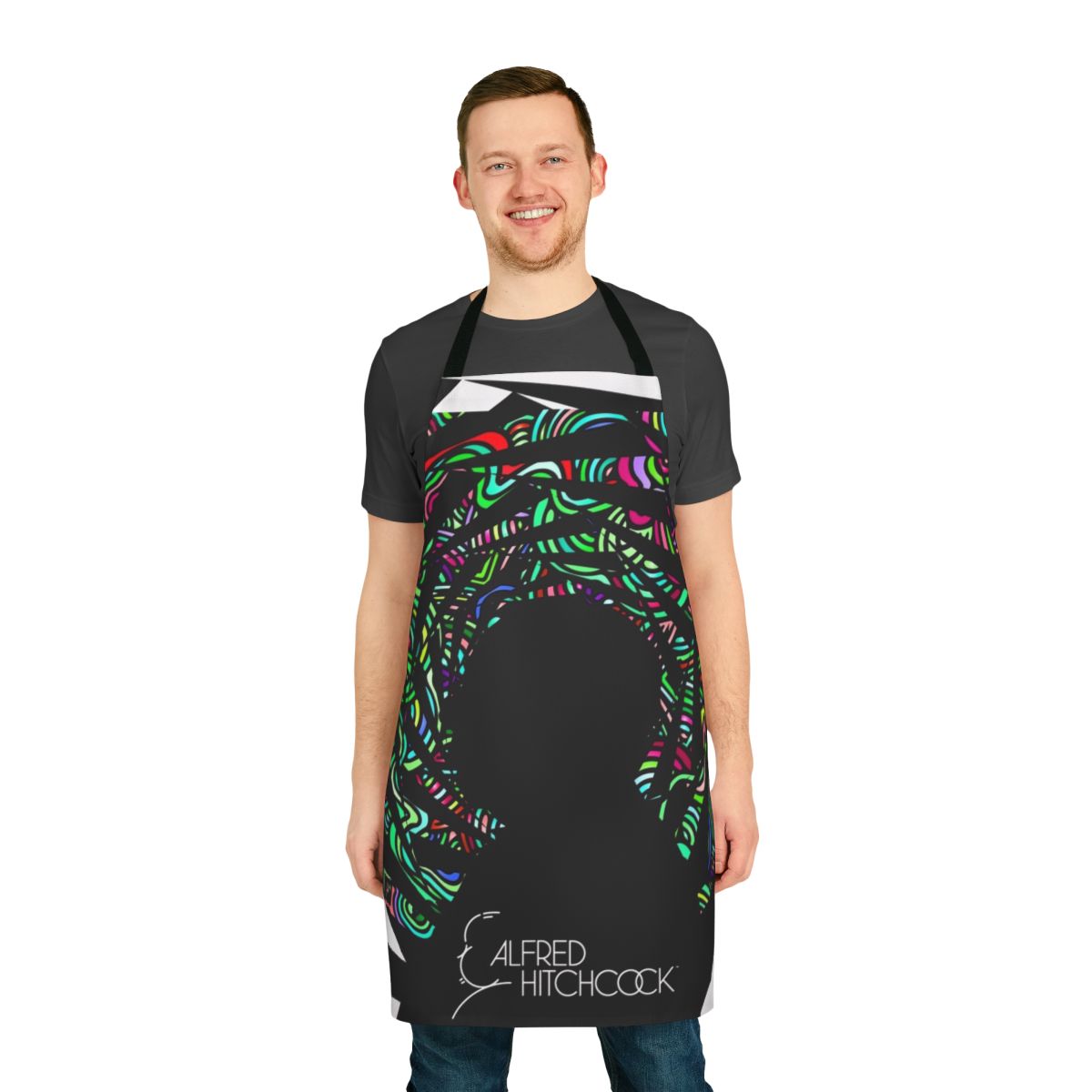 An apron featuring the iconic silhouette of Alfred Hitchcock and the title of his classic film Vertigo