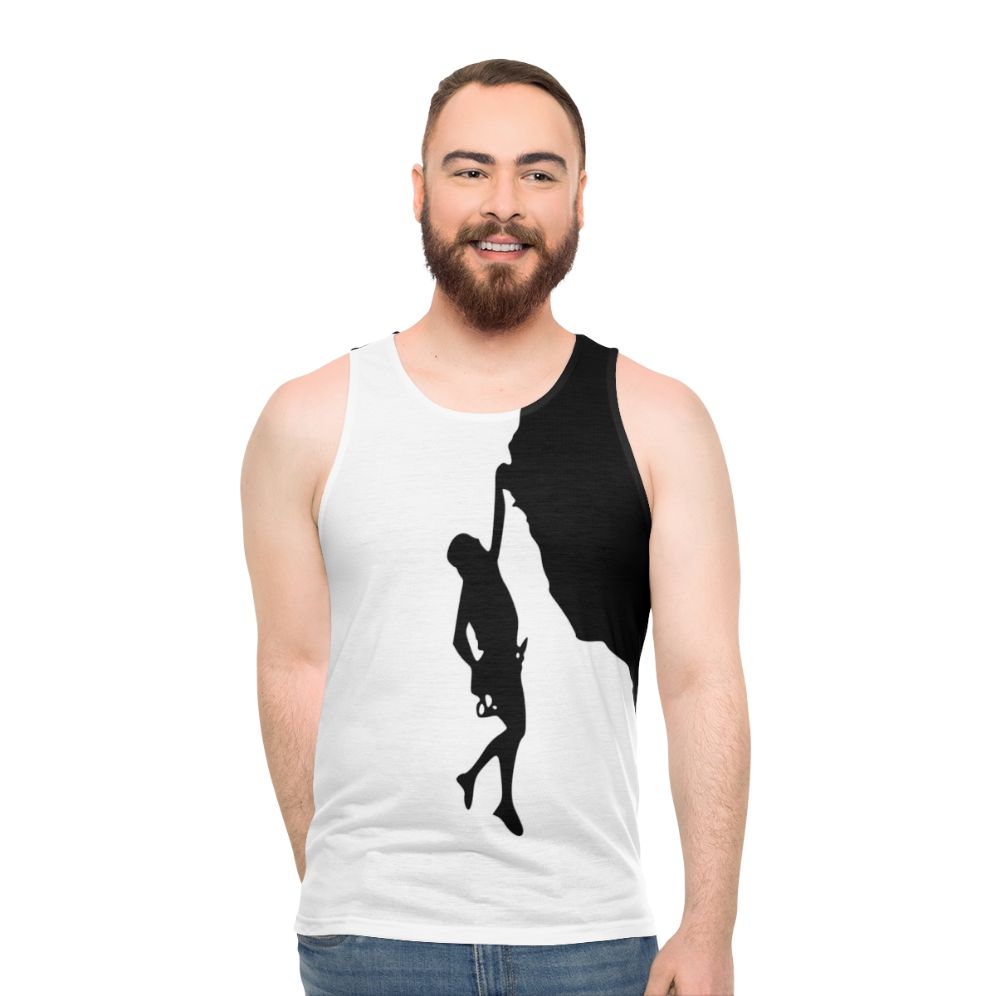 Man climbing rock wall wearing Climb Cliffhanger Unisex Tank Top