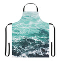 A blue and white apron with a beautiful ocean waves pattern, perfect for beach-themed kitchens.
