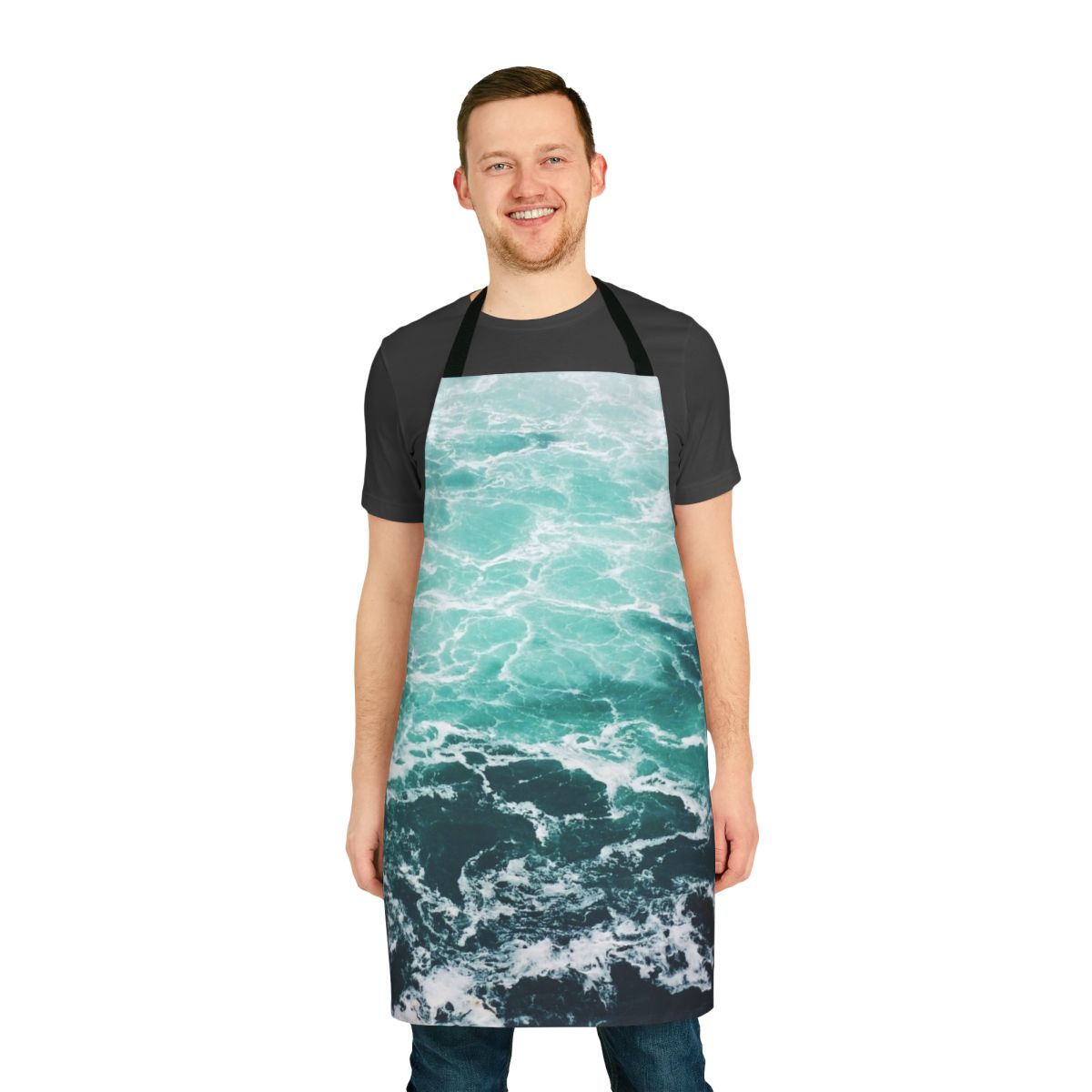 A blue and white apron with a beautiful ocean waves pattern, perfect for beach-themed kitchens.