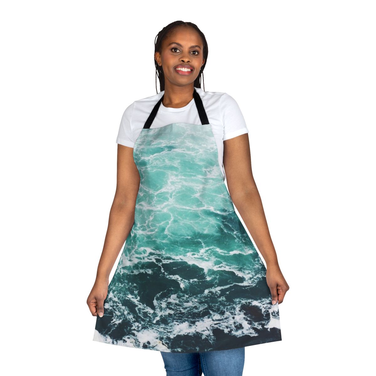 A blue and white apron with a beautiful ocean waves pattern, perfect for beach-themed kitchens.