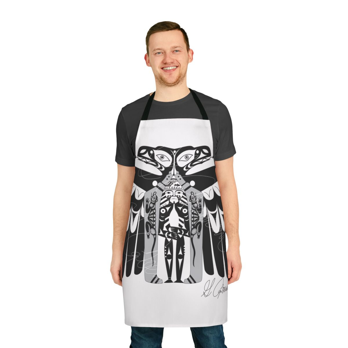 Raven Apron featuring a coastal design with a black bird silhouette against a sunset backdrop