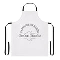 Outer Banks-inspired apron featuring beach waves and a lighthouse