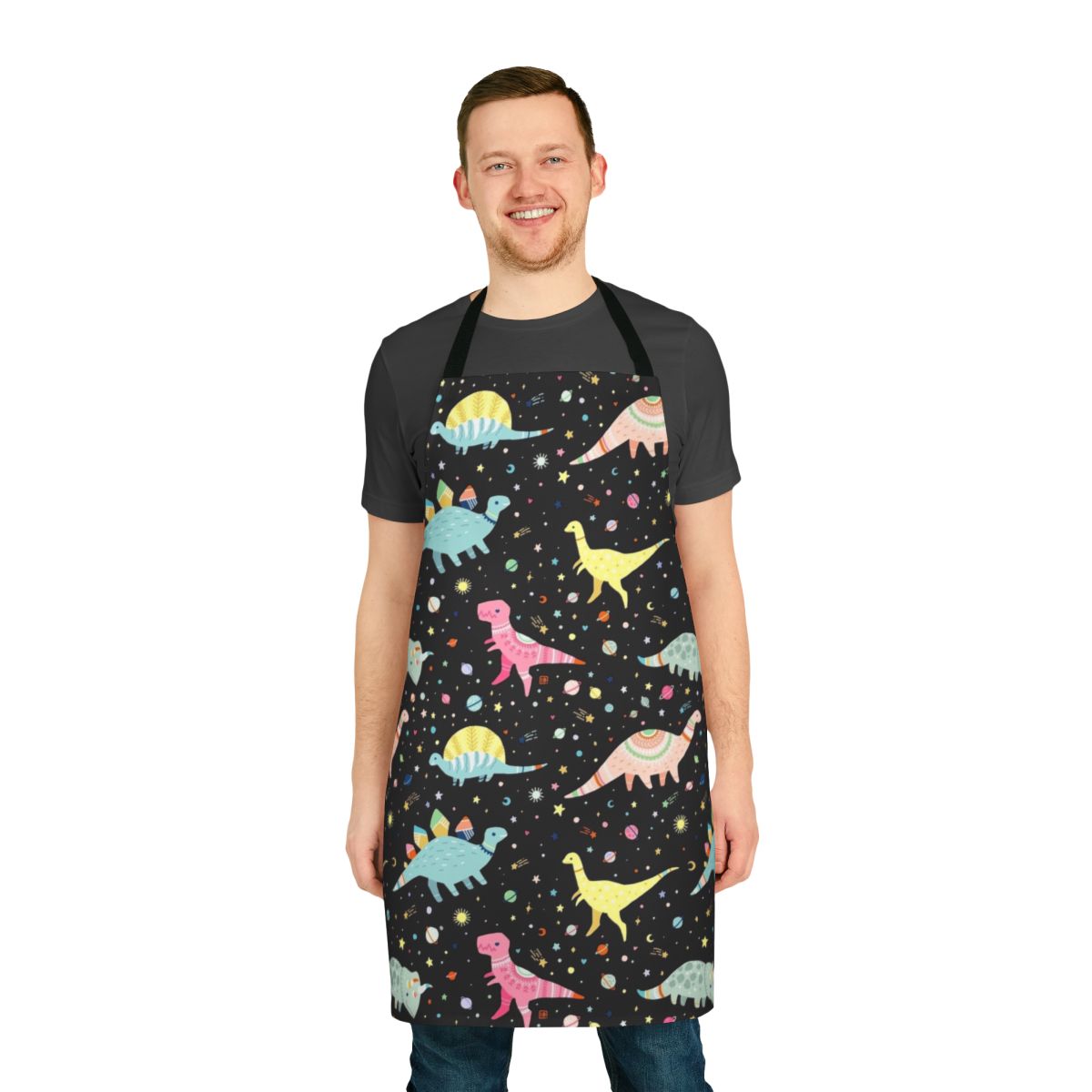 Vibrant dinosaur-themed apron with a variety of prehistoric creatures in a whimsical, rainbow-colored pattern