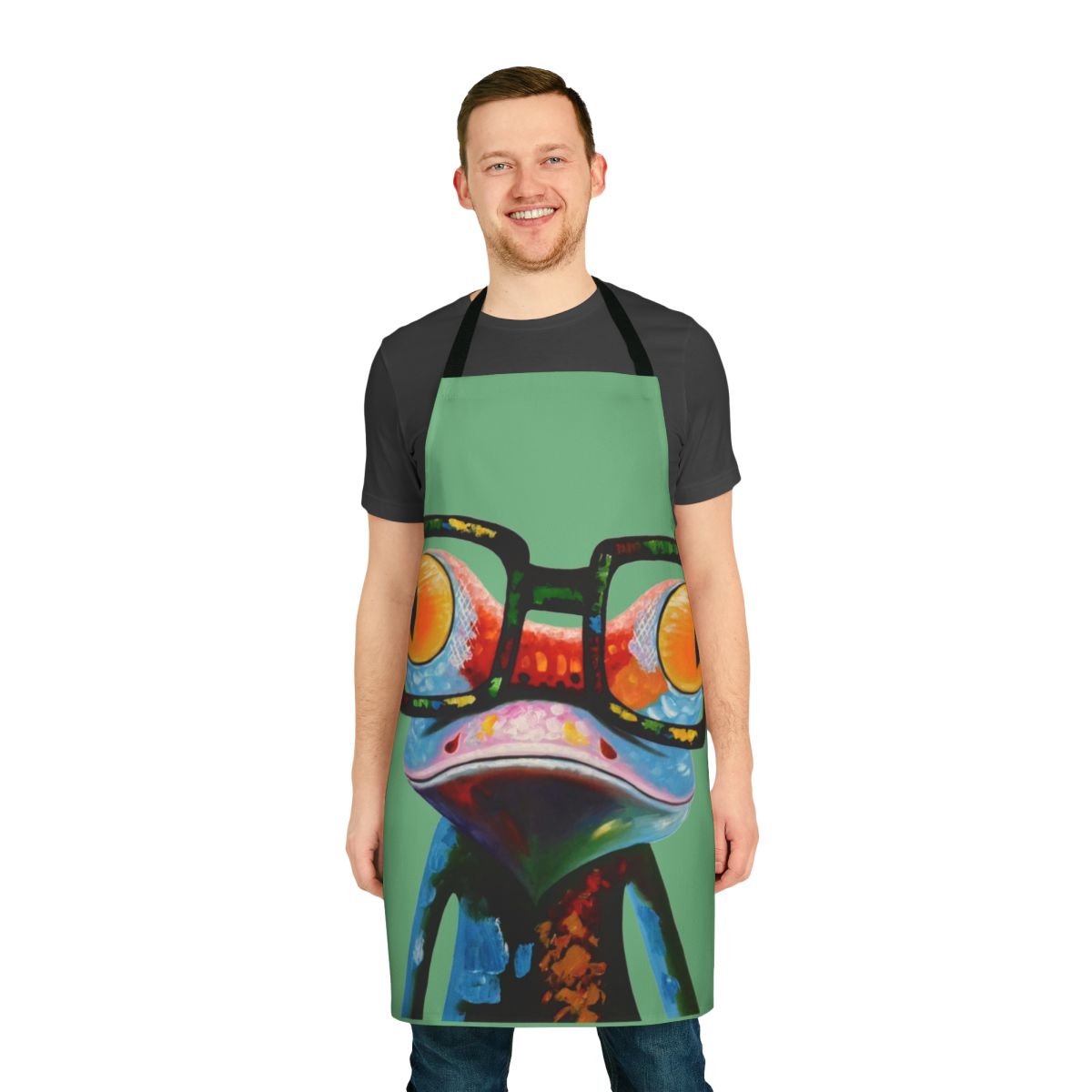 Colorful apron featuring a quirky illustration of a frog wearing nerd glasses