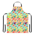Whimsical apron featuring a vibrant pattern of gummy candies, sharks, and other sweets