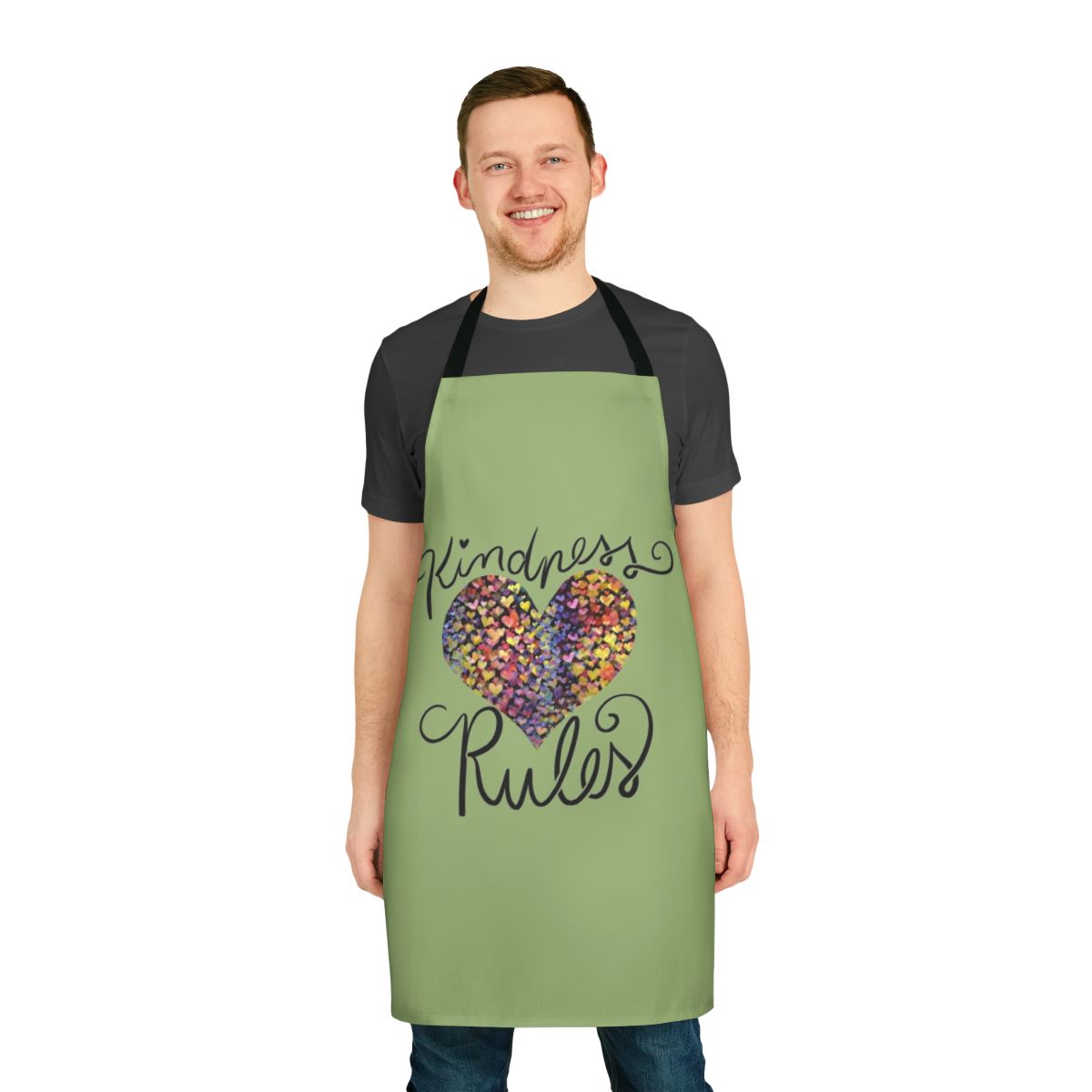 Colorful apron with rainbow and heart design, featuring the text "Kindness Matters"