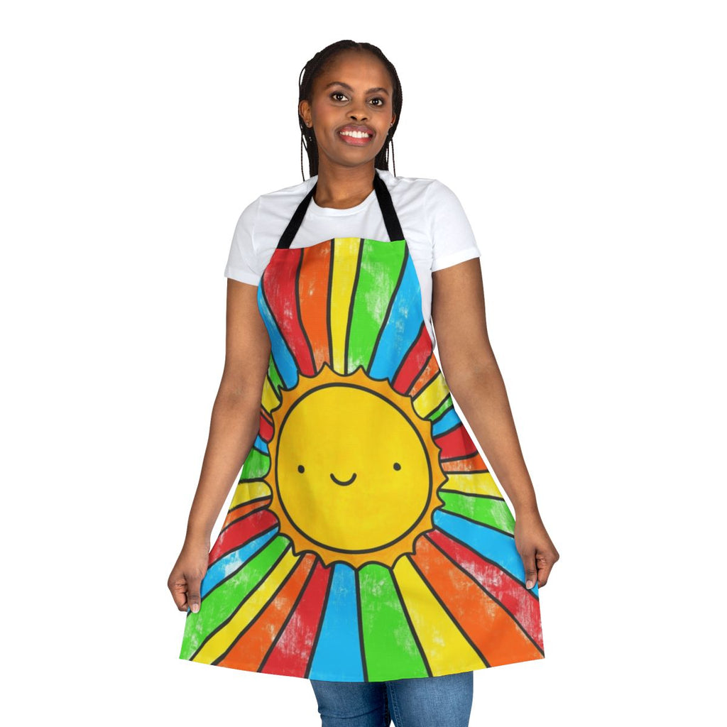 Colorful apron with a 'Radiate Positivity' design, featuring a sun, rainbow, and smiling faces.