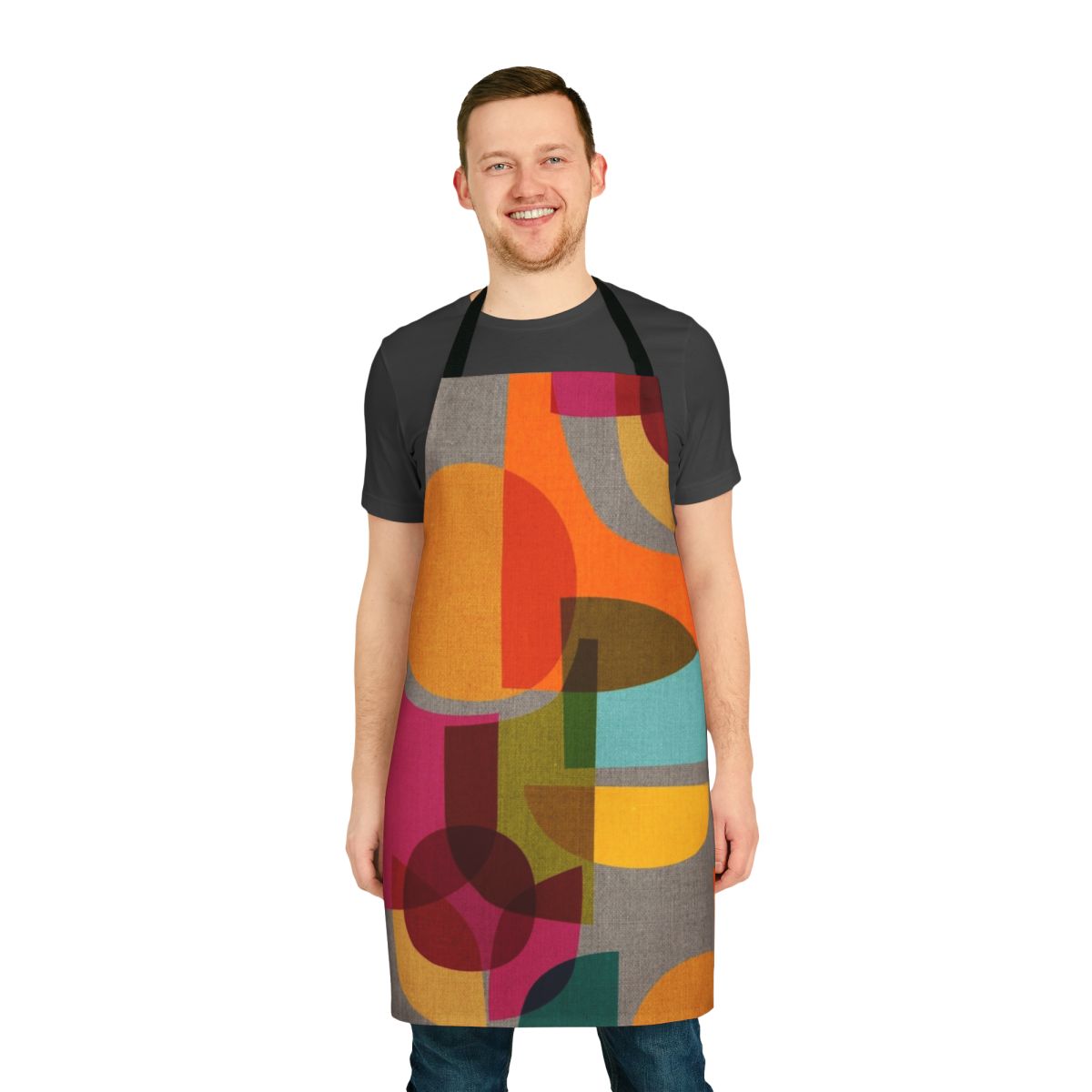Vibrant multicolor apron with a mid-century modern, Scandinavian-inspired geometric kaleidoscope pattern.