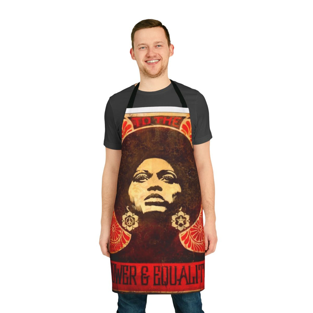 An apron featuring a vintage-style illustration of Angela Davis, a prominent figure in the Black Panther Party and the Black Power movement.