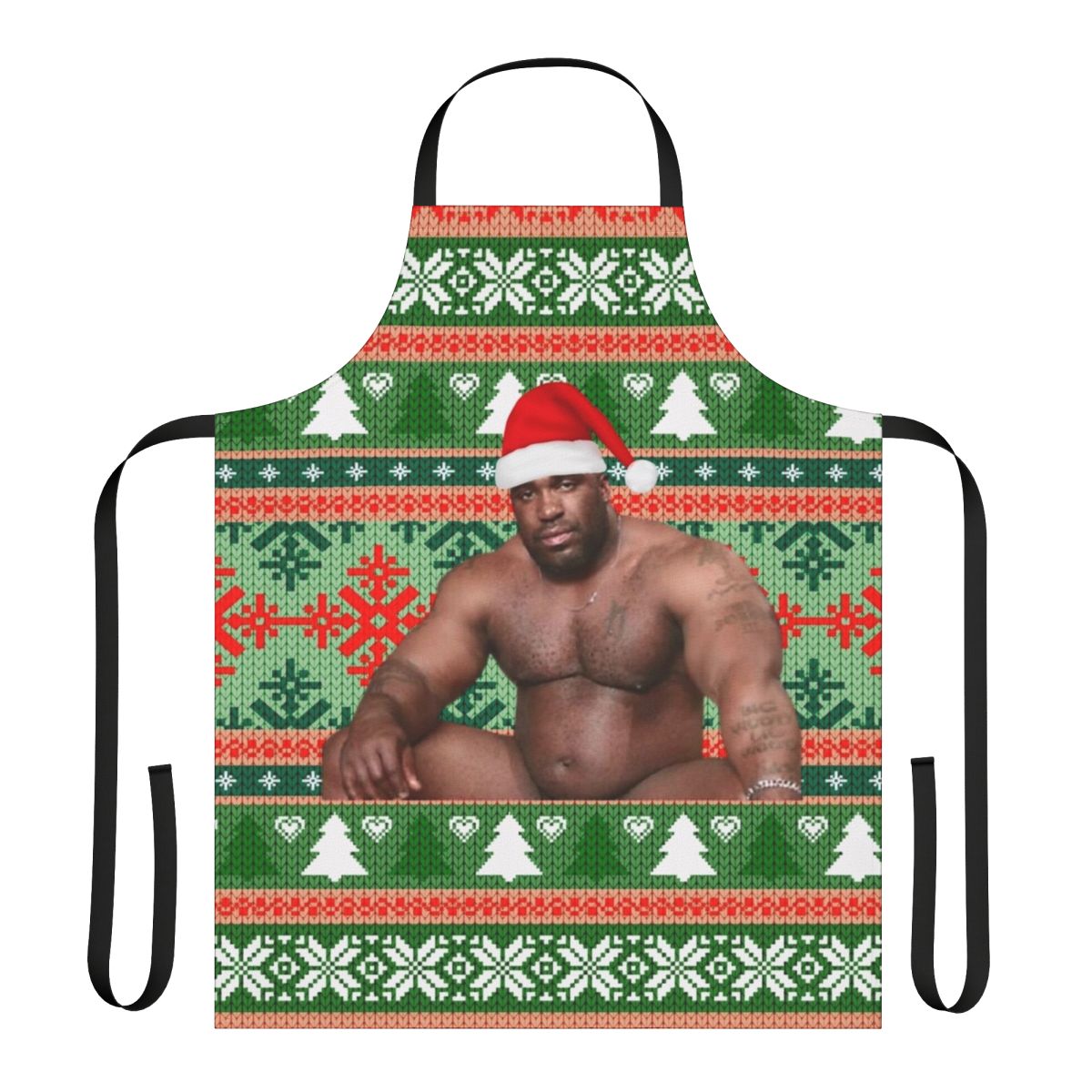 Barry Wood wearing a Christmas apron with festive holiday design