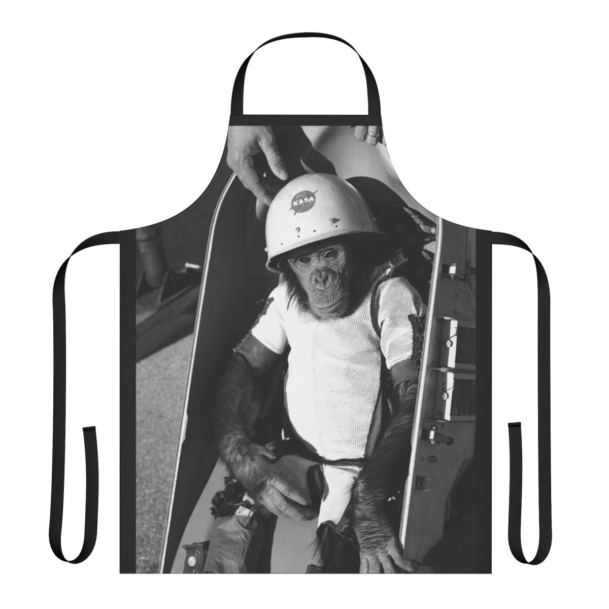 Commemorative apron featuring a chimpanzee astronaut in a space suit