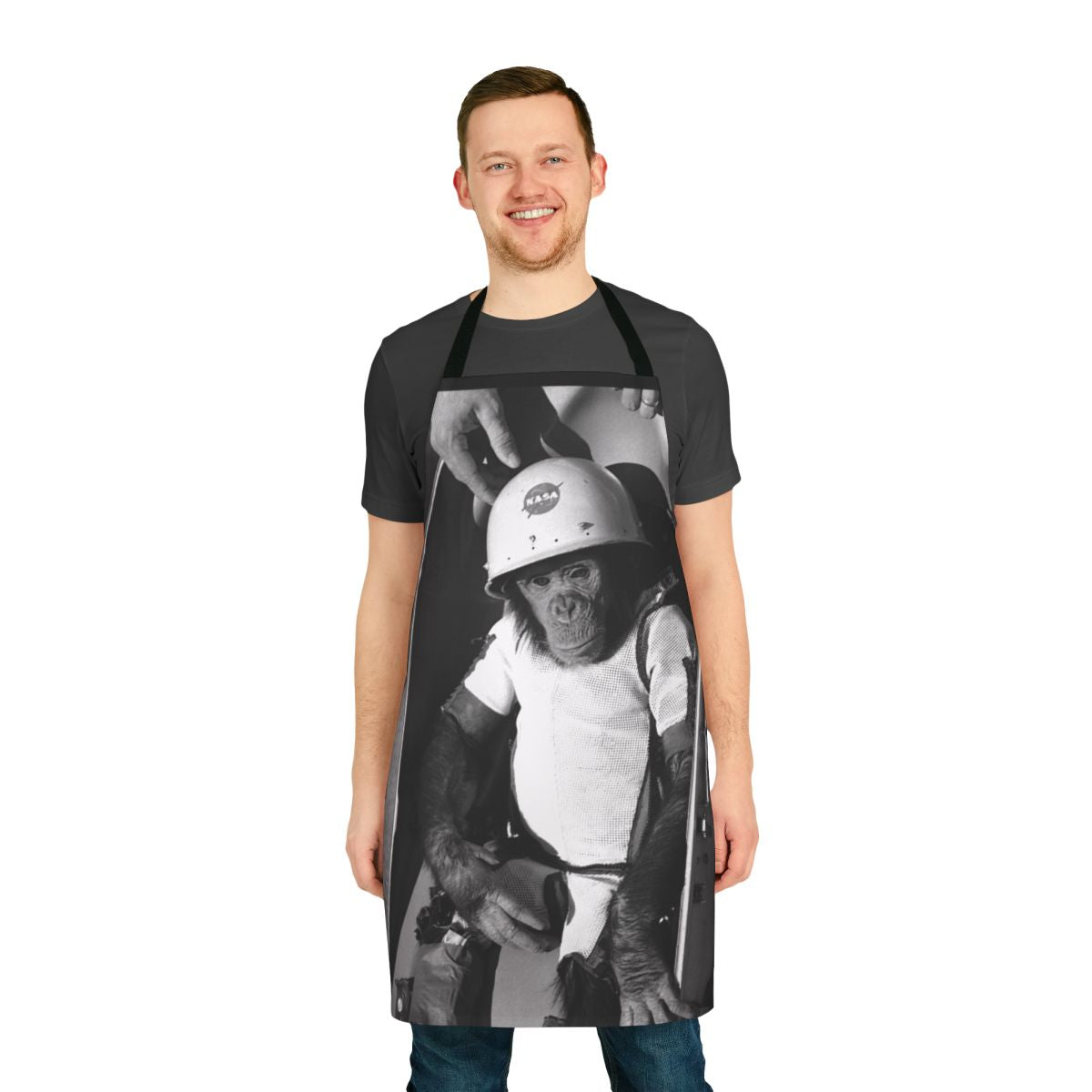 Commemorative apron featuring a chimpanzee astronaut in a space suit