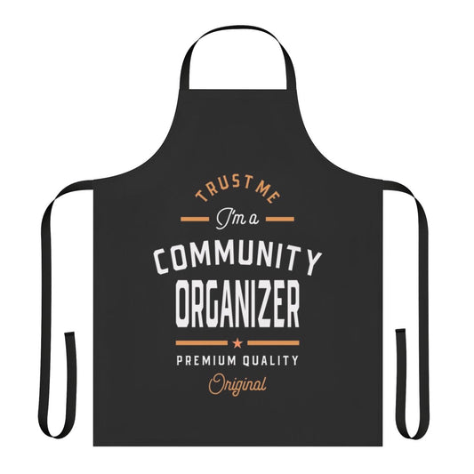 Community organizer wearing an apron with "I M A Community Organizer" text