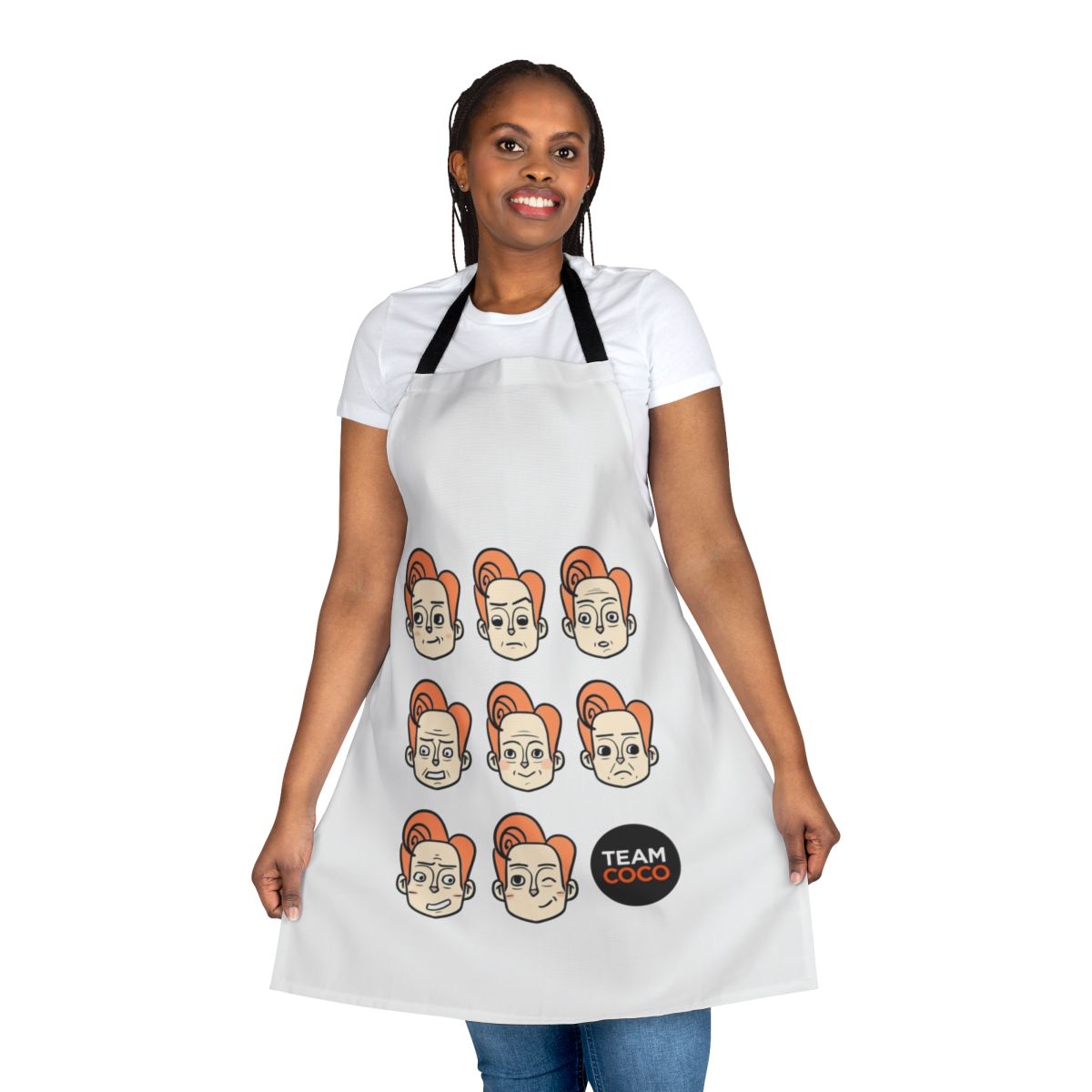 Conan-themed kitchen apron featuring various expressions and faces of the popular late-night host Conan O'Brien
