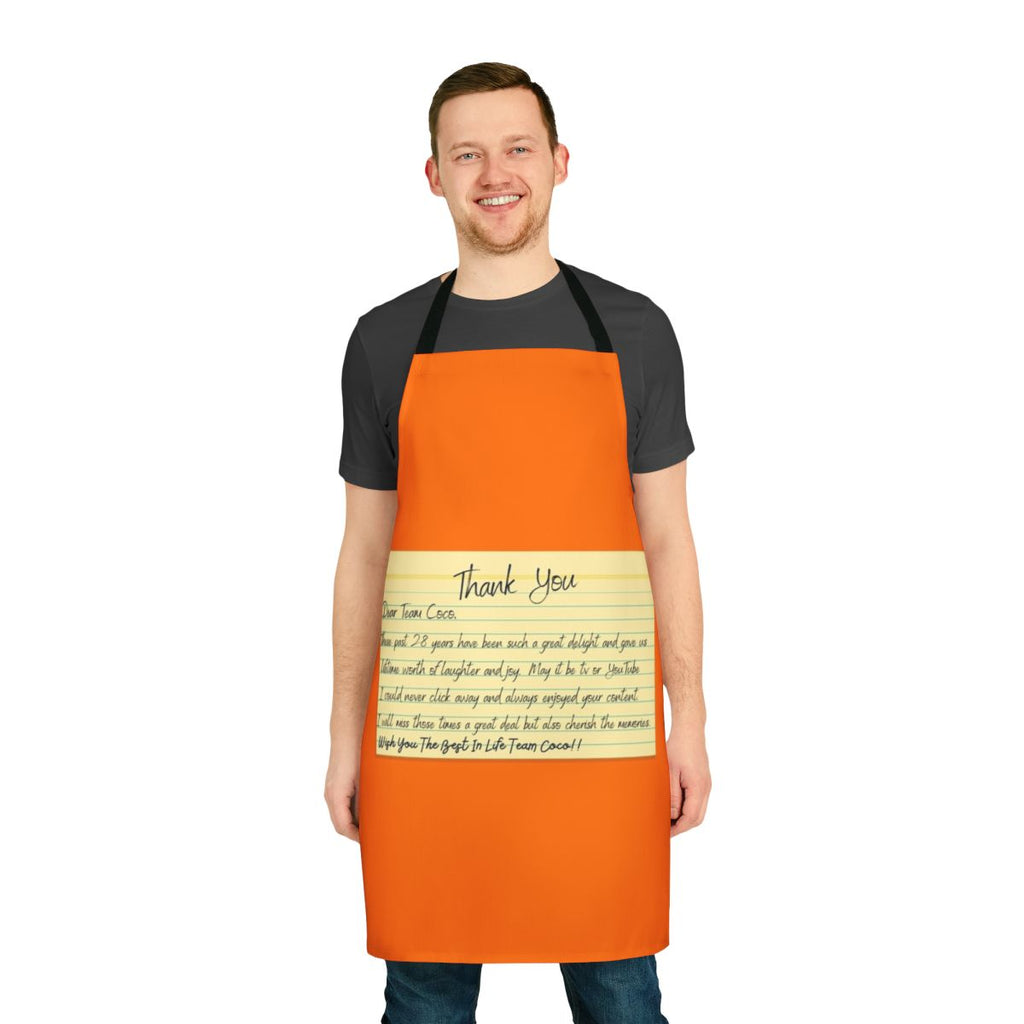 A black and red cooking apron featuring the "Team Coco" logo and a "Thank You" message, inspired by the popular late night talk show host Conan O'Brien.