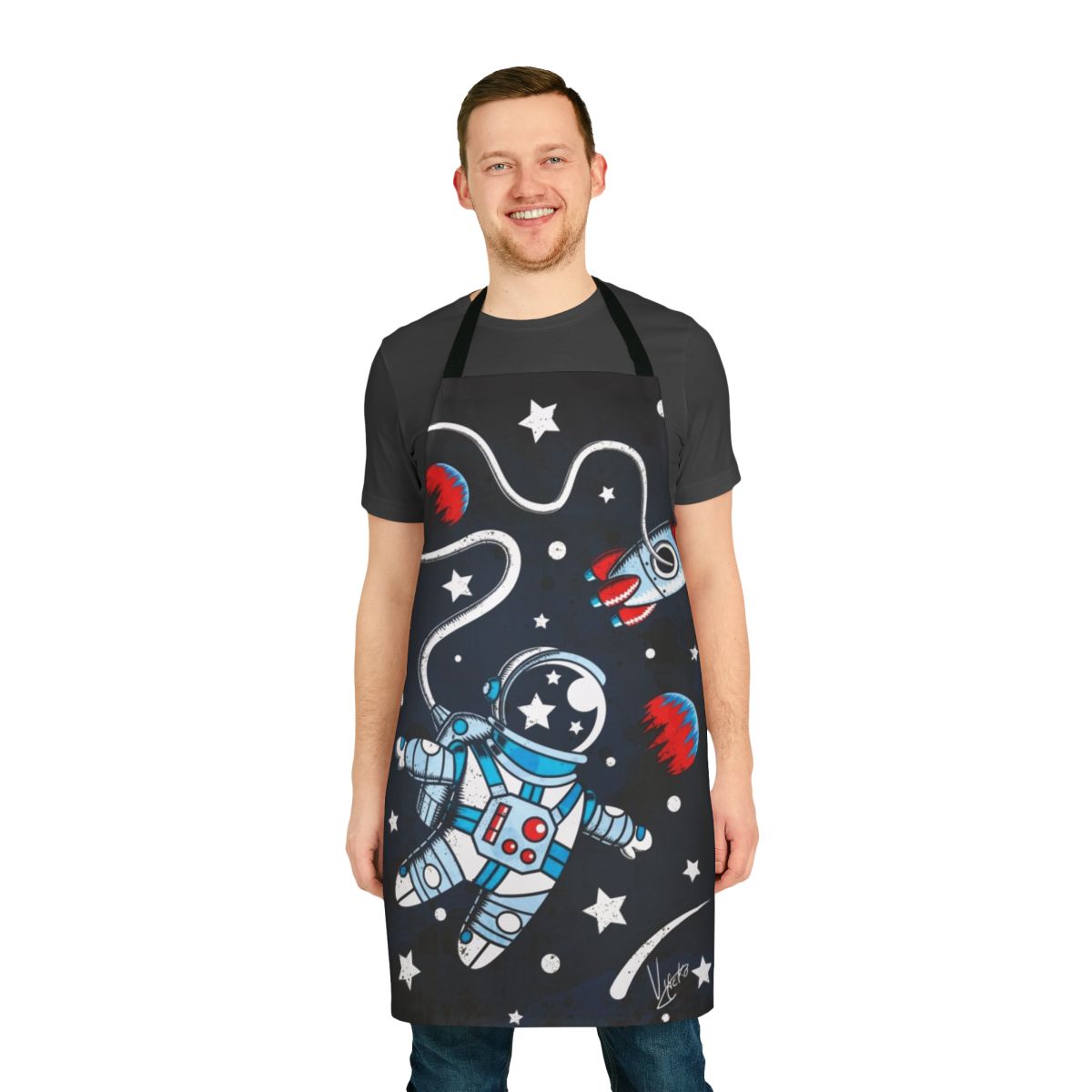 A stylish apron featuring a surreal space-themed design with the moon, stars, and planets.