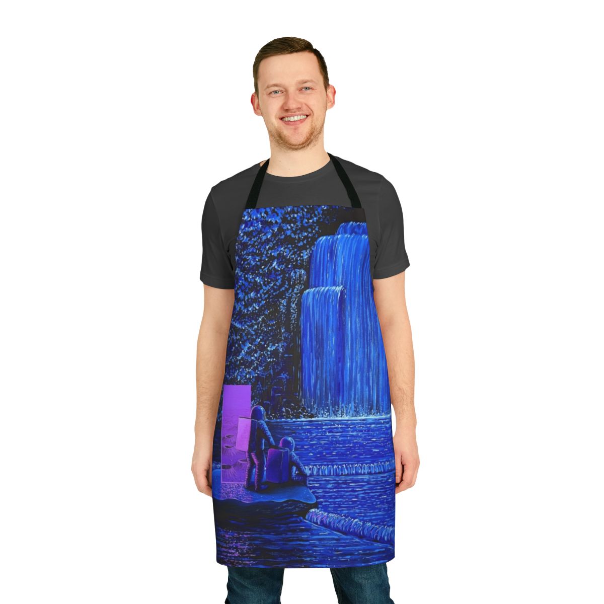 Cosmic apron with a surreal night falls design featuring an astronaut, waterfall, and celestial elements