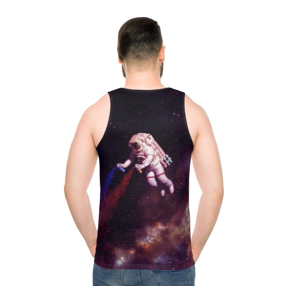 Unisex tank top featuring a cosmic astronaut artist design