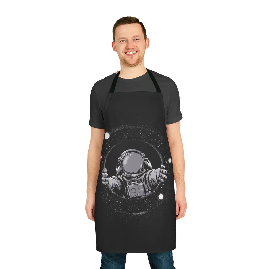 Black hole themed kitchen apron with space and galaxy design