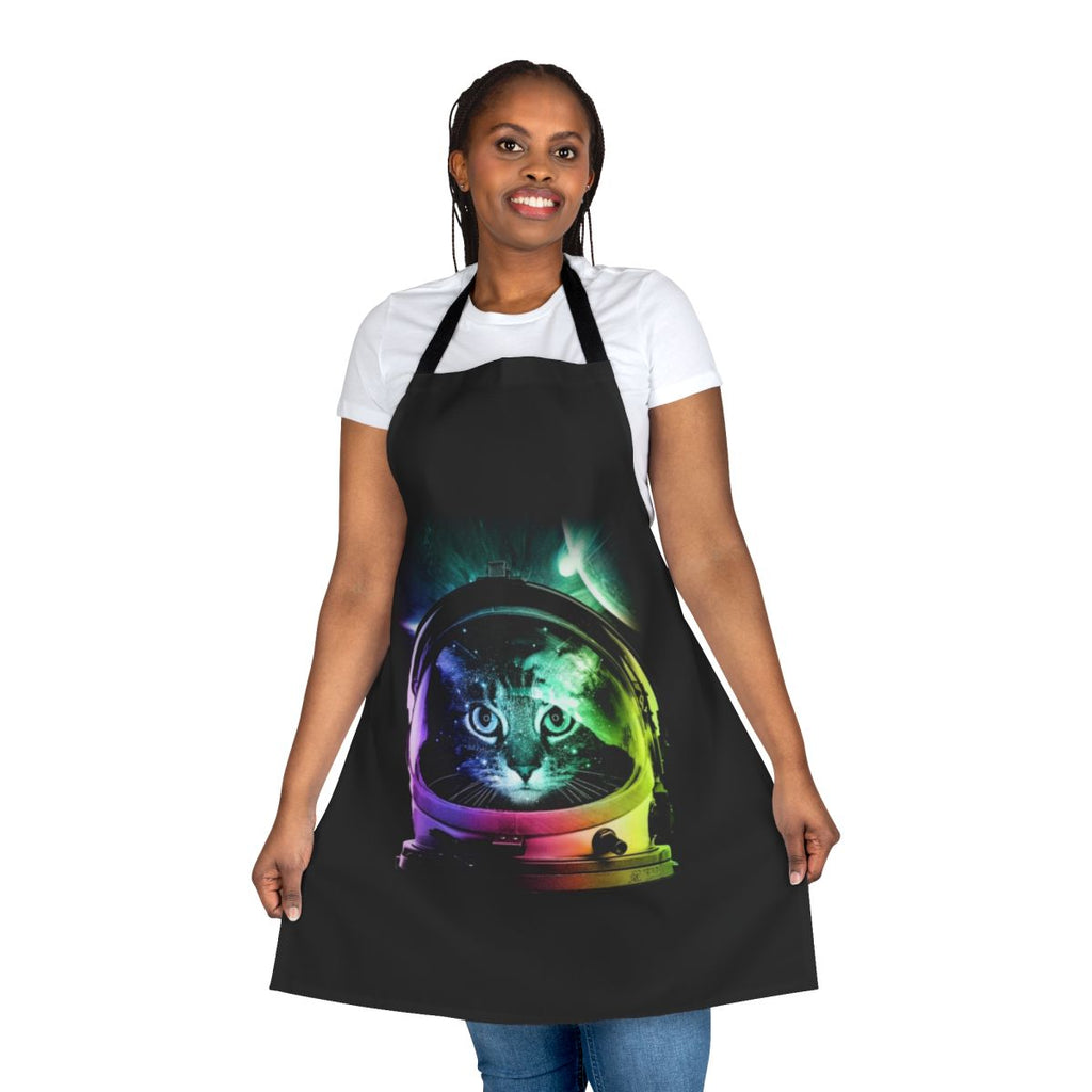 A colorful apron featuring an adorable cat astronaut in a space-themed design