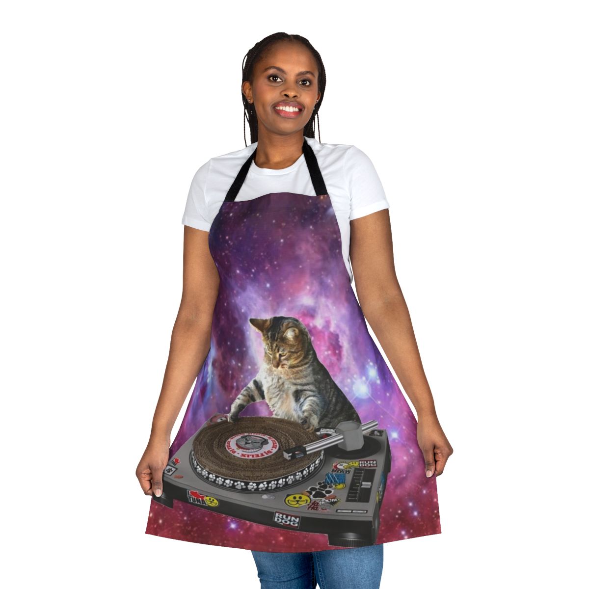 A vibrant, space-themed apron featuring a whimsical cat DJ design, perfect for kitchen or household use.