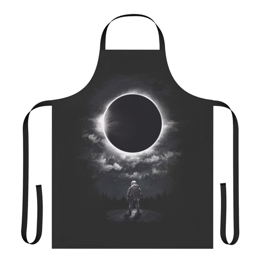 Cosmic Eclipse Apron featuring a dramatic black and white design with celestial elements like the moon, sun, and stars.