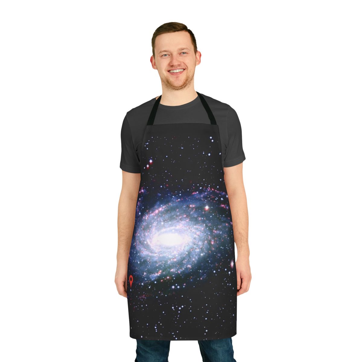 Apron with a cosmic galaxy print design featuring stars, planets, and nebulae