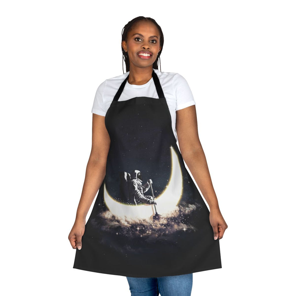 Whimsical apron featuring a surreal moonscape with a sailboat floating in the cosmic expanse