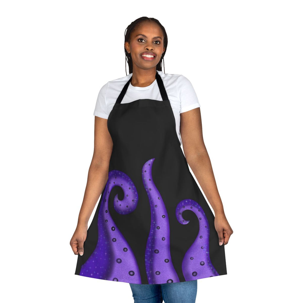 Model wearing a pastel galaxy print apron with tentacle design, inspired by the Disney villain Ursula.