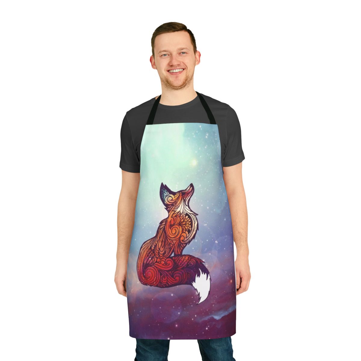 Photo of a space-themed apron featuring a fox in a cosmic nebula setting