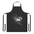 Black and white image of an apron with a surreal, space-inspired design featuring planets, stars, and an astronaut silhouette.
