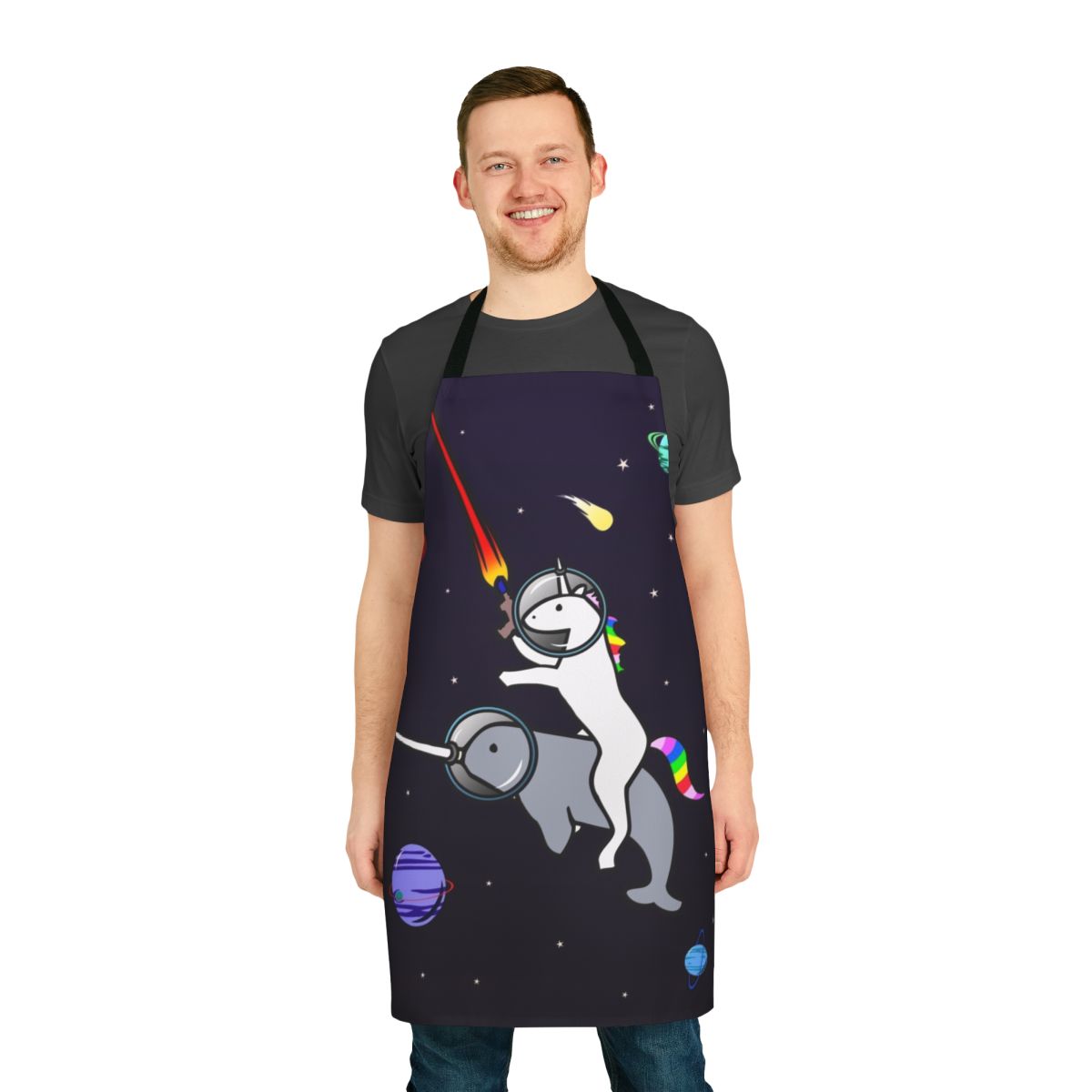 Whimsical apron featuring a unicorn riding a narwhal in outer space