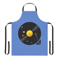 Cosmic Vinyl Record Apron featuring a vibrant solar system design