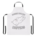 White cat sleeping on an apron
