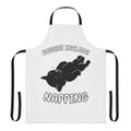 Apron featuring a black cat napping and the text "Hobbies Include Napping"