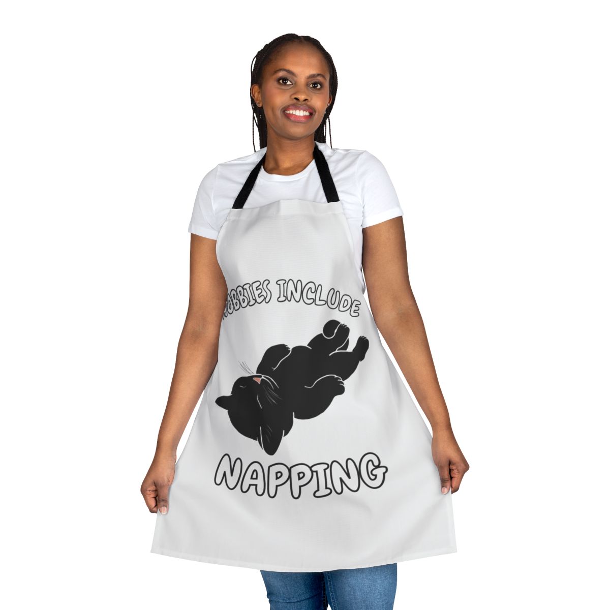 Apron featuring a black cat napping and the text "Hobbies Include Napping"