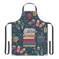A dark green and pink apron with a cute cat sleeping on a book design, perfect for embracing the hygge lifestyle.