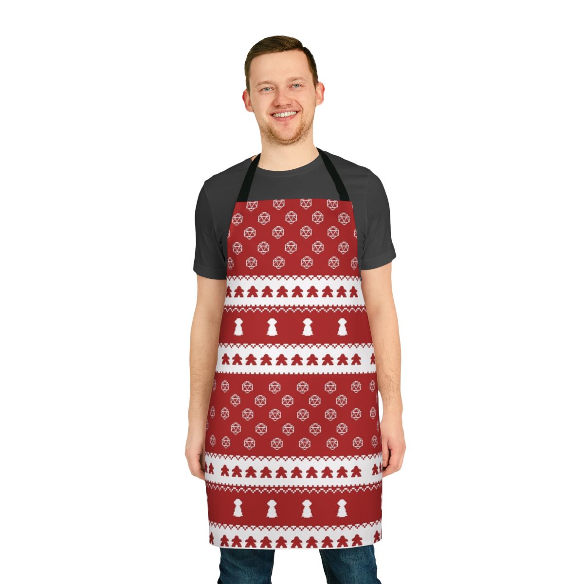 A cozy holiday-themed apron with a playful board game and snowflake design.