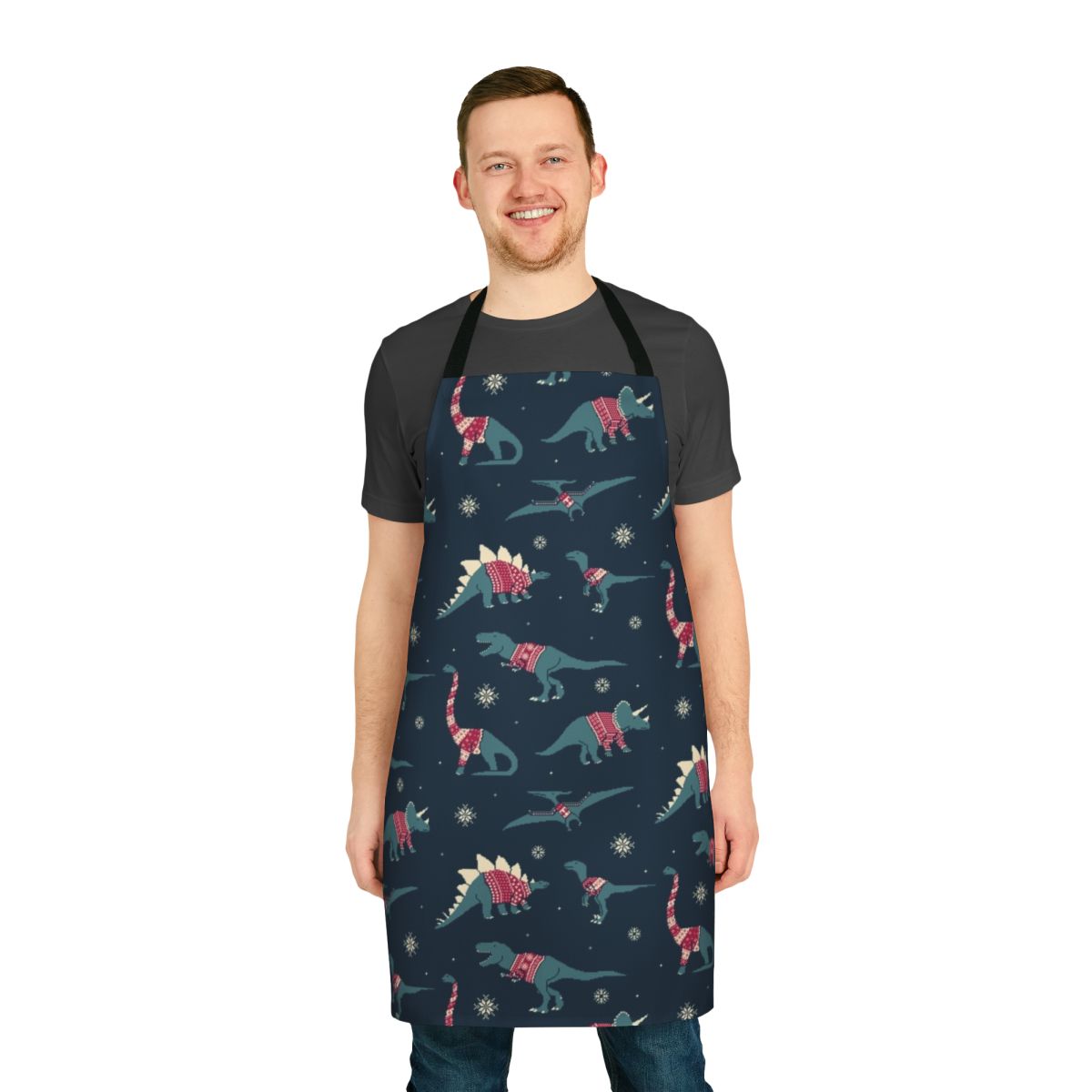 Apron with cute pixel art dinosaurs wearing colorful sweaters