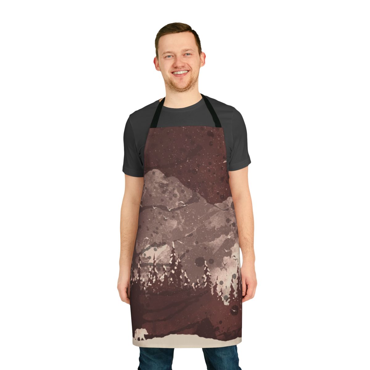 Winter landscape featuring a bear with snow-covered mountains and trees in the background, with the text "Cozy Winter Bear Nature Apron"