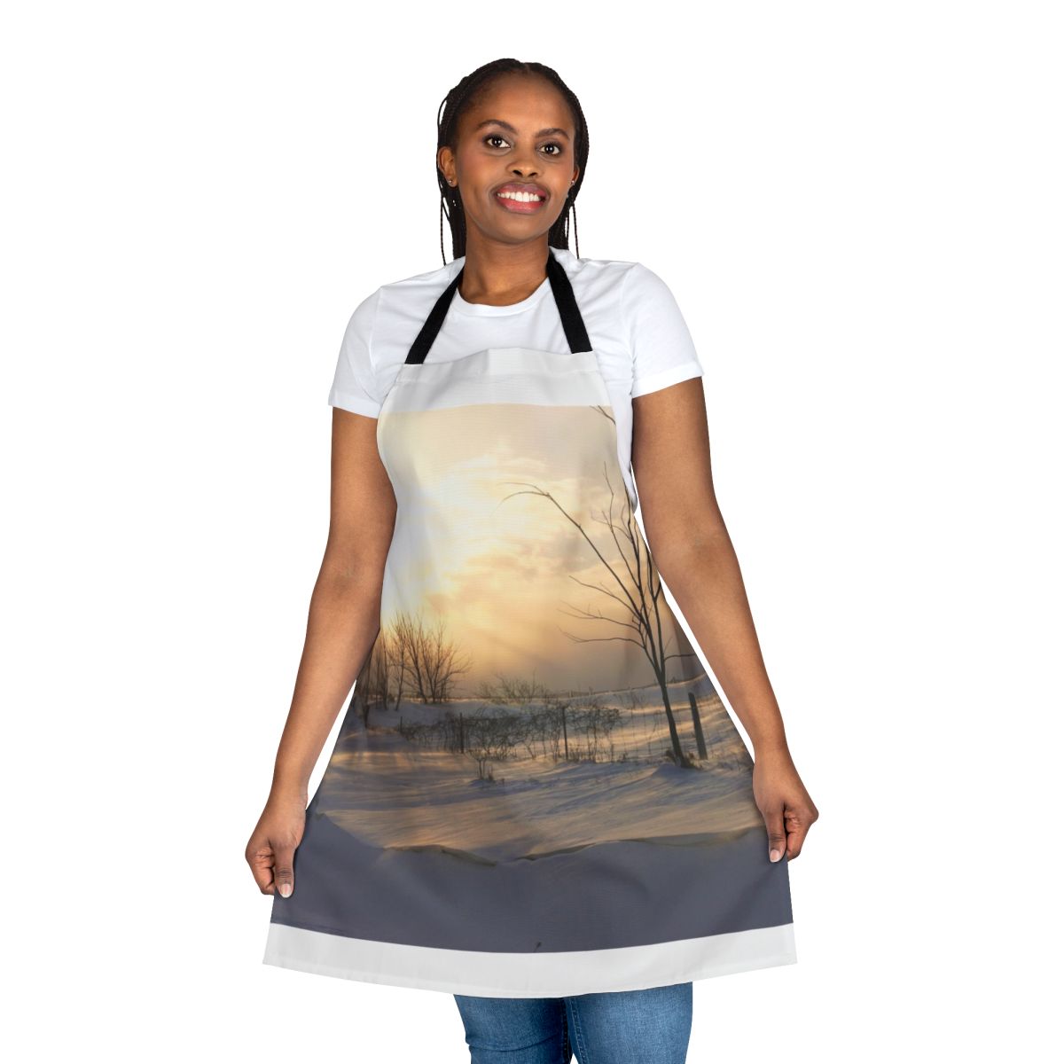 Woman wearing a bright, cozy winter-themed apron while cooking in the kitchen