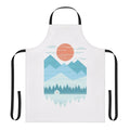 Pastel-colored apron with a winter cabin design