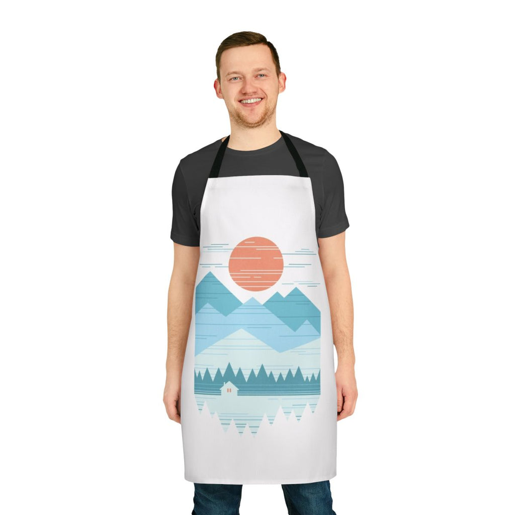 Pastel-colored apron with a winter cabin design