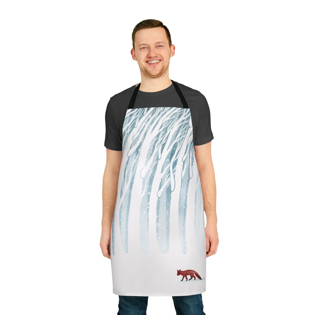 Apron with a winter storm, forest, and fox design