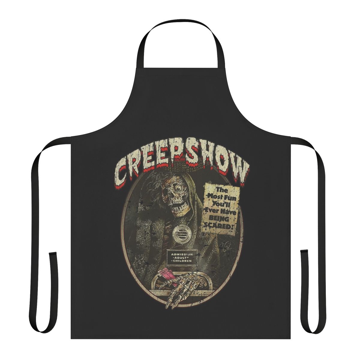 A black apron featuring a spooky skeleton and skull design inspired by the 1982 horror movie Creepshow.