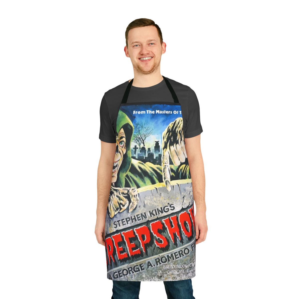 A dark and gory apron featuring imagery inspired by the "Creepshow" horror anthology series.