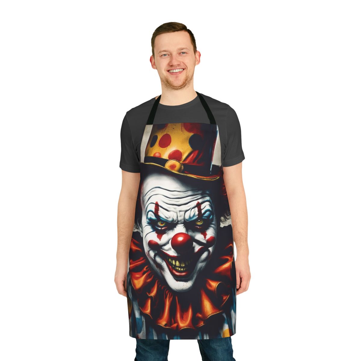A frightening clown with a creepy face printed on a black apron, perfect for Halloween or horror-themed events.