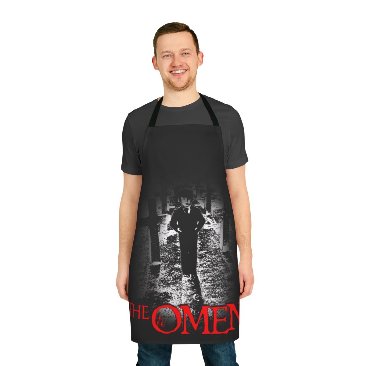 A black apron with a creepy design inspired by the horror movie "The Omen"